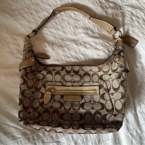 Coach monogrammed gold shoulder bag